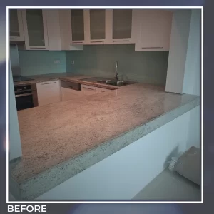 Granite countertop before restoration – faded color and visible surface damage in dubai kitchen.