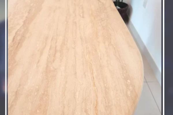 After travertine tabletop filling and polishing by hft dubai – natural texture restored and glossy surface achieved.